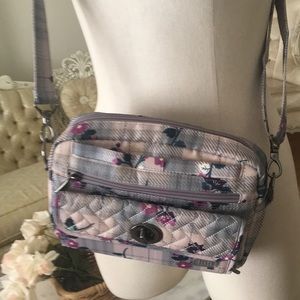 Lug crossbody bag water repellent/adjustable straps billfold/4 compartments